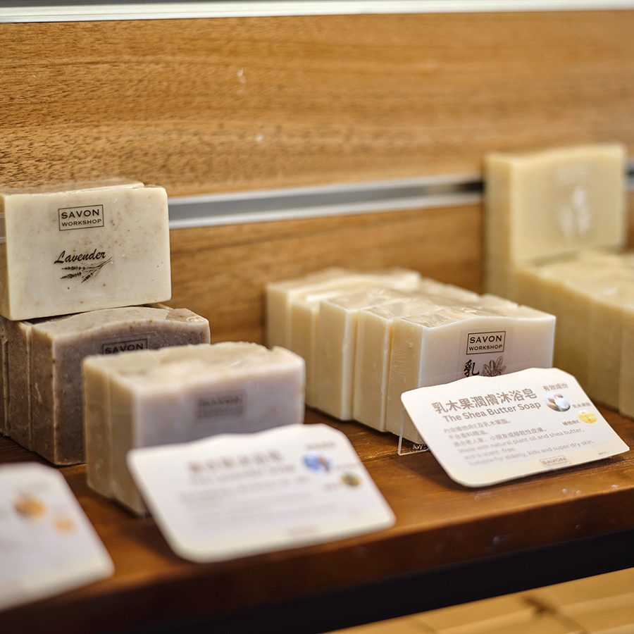 Bars of handmade soap on a shelf in Savon Workshop, Sham Shui Po, Hong Kong. 