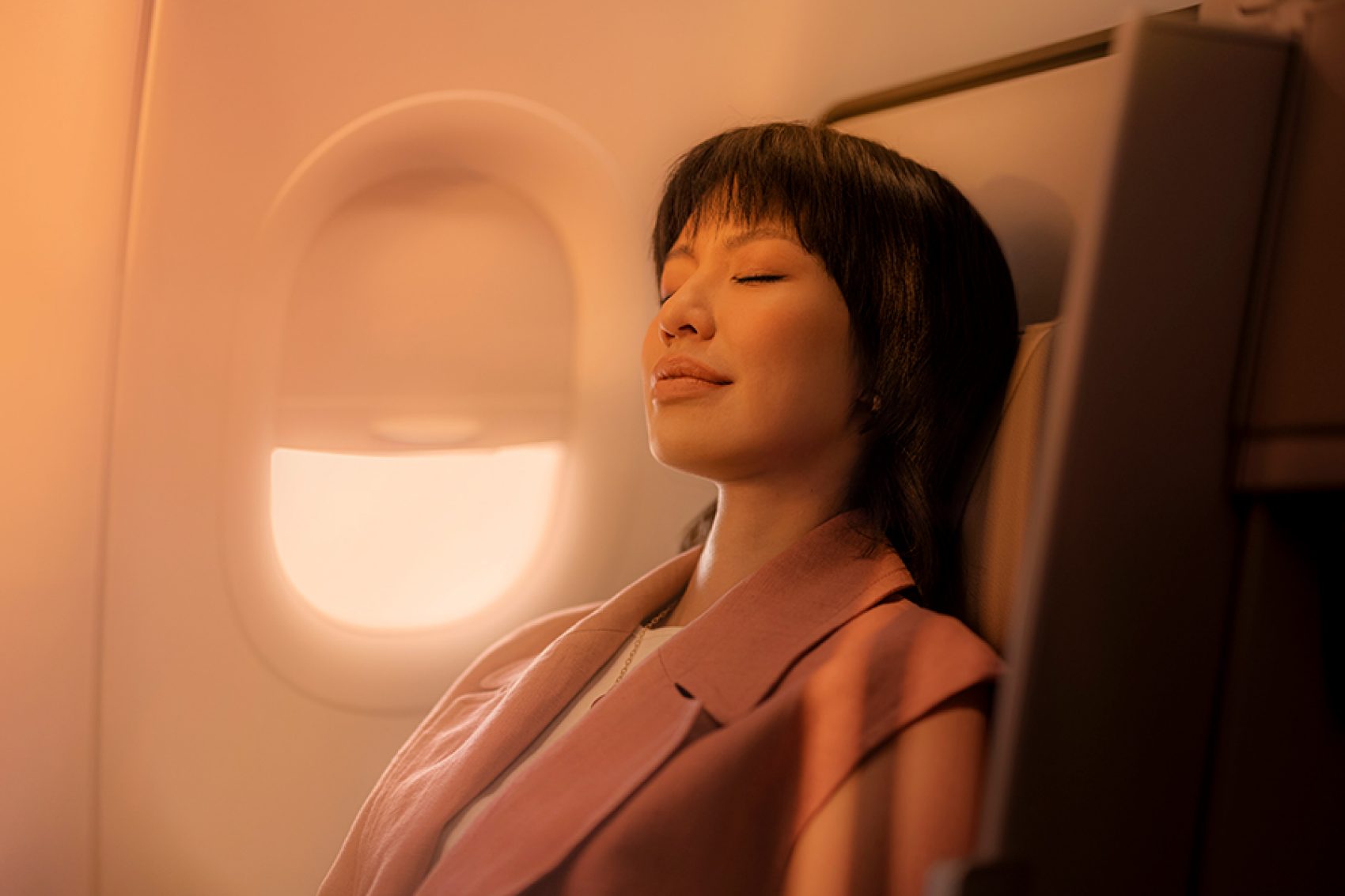 Woman relaxing on the plane