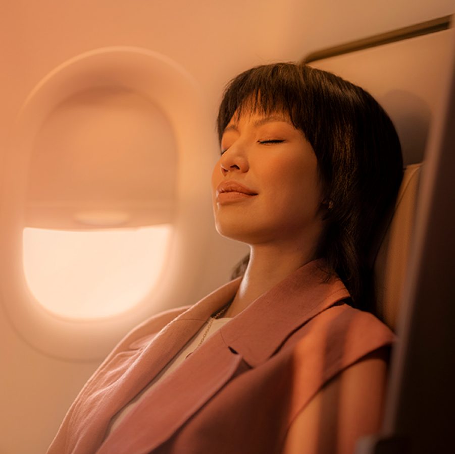 Woman relaxing on the plane