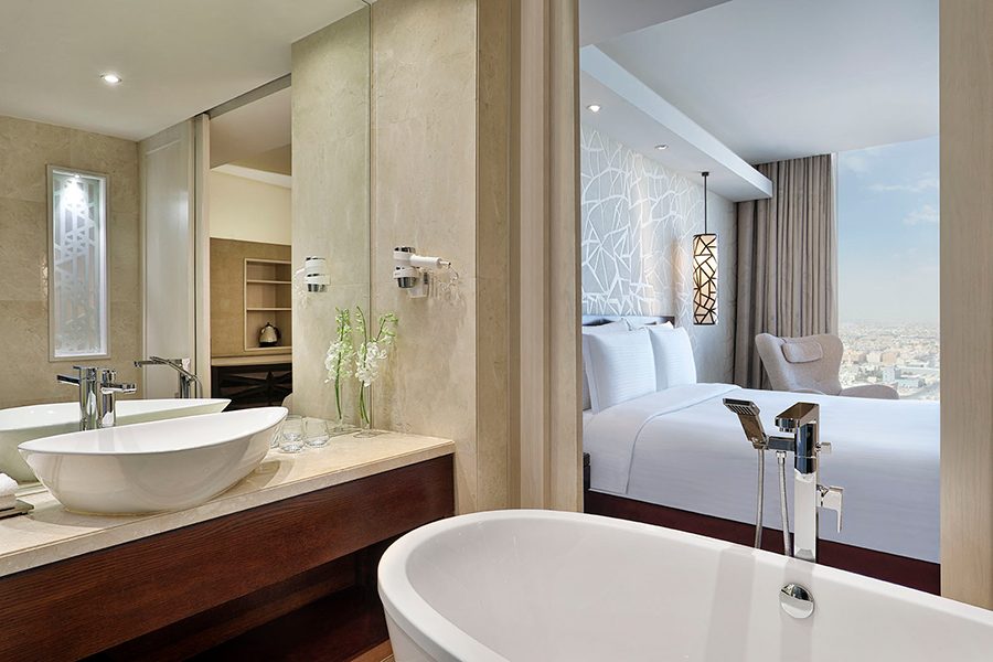 Bedroom and bathroom at JW Marriott Hotel Riyadh