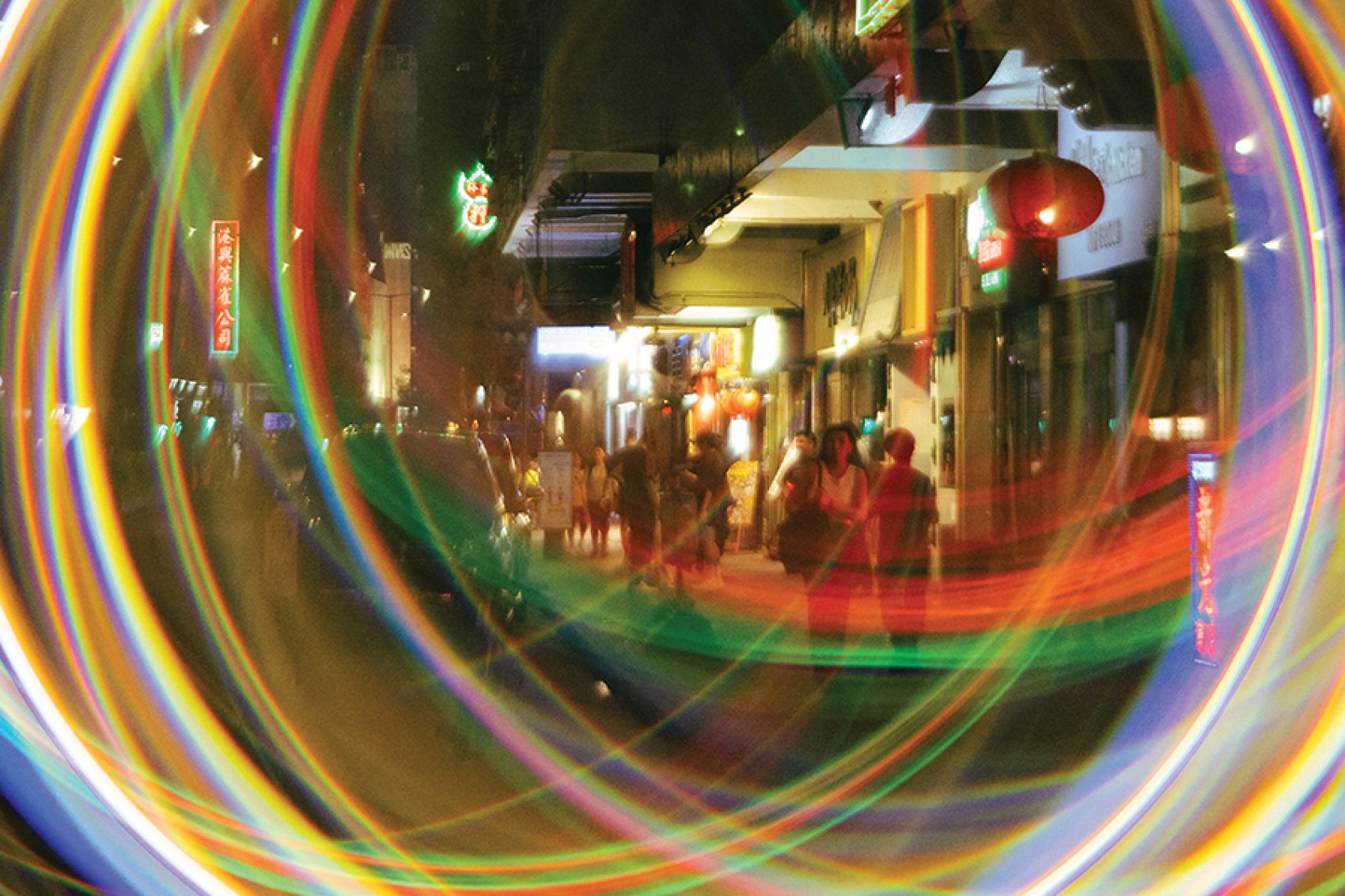 Hong Kong at night through a blurred lens with light effect