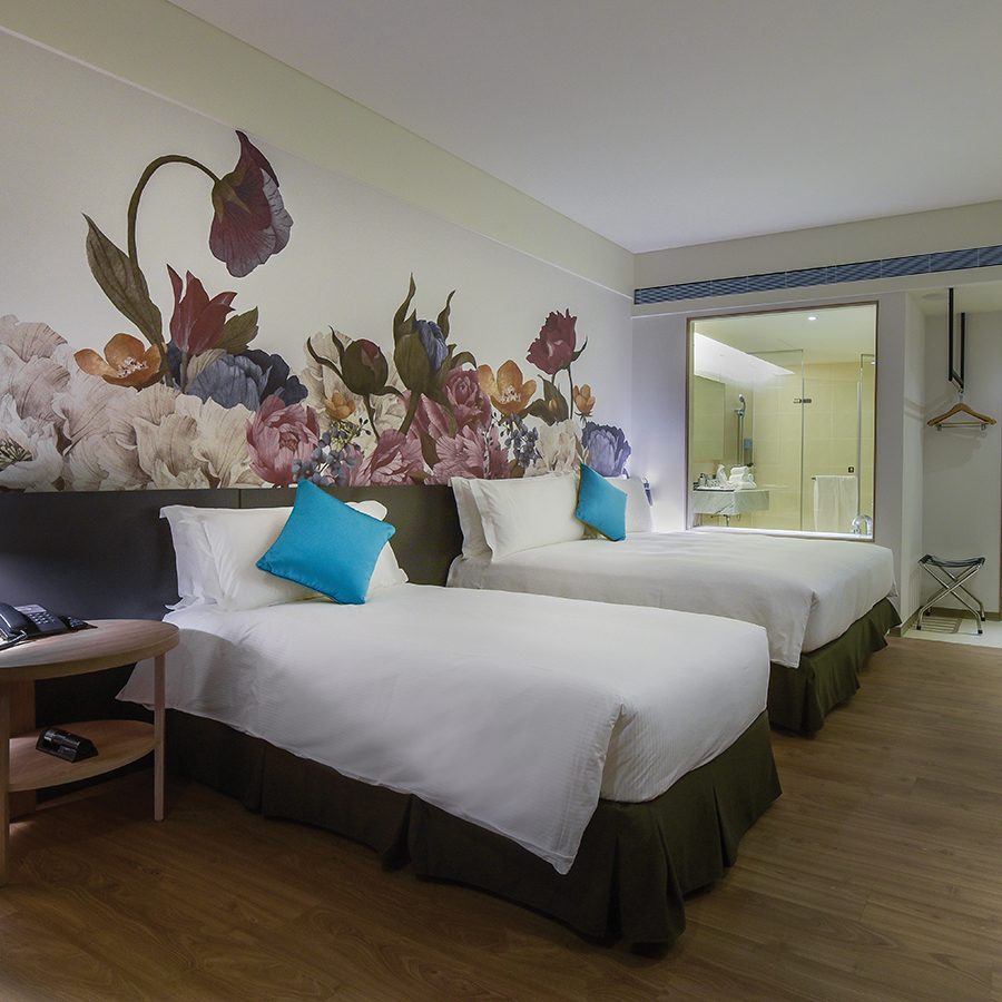 The interior of a two single bedroom at Just Sleep Kaohsiung Station, Taiwan