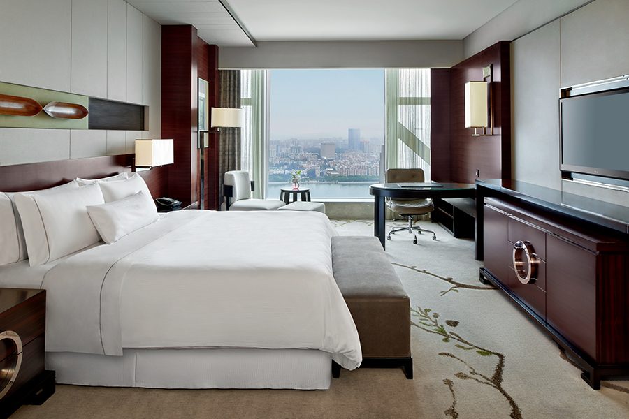 A photo of a bedroom at The Westin Pazhou with a king size bed and nice view