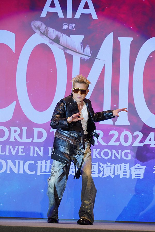 Aaron Kwok performing on stage in concert