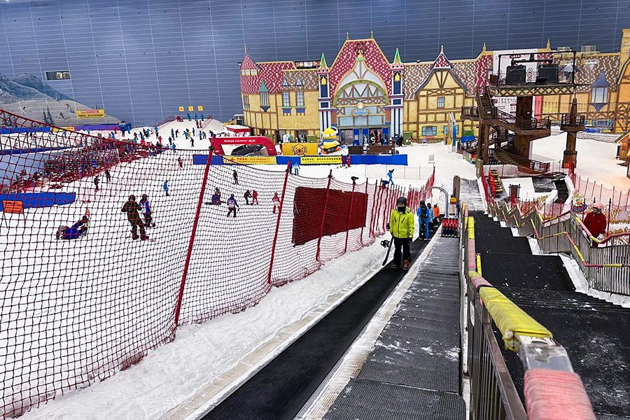 The beginners’ automated “magic carpet” ride up to the top of a slope in Guangzhou Sunac Snow Park