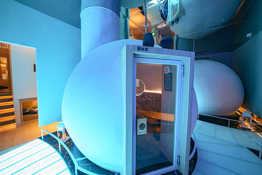 A spherical steam room with a glass door in Heat Joy Spa