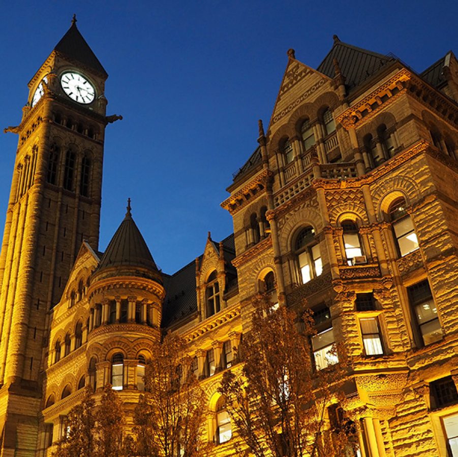 Old City Hall, Toronto, lit up at night.