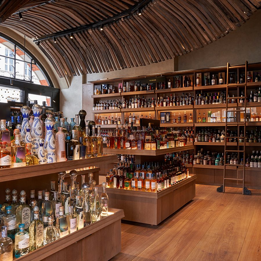 A cellar filled with bottles of wine and spirits at Berry Bros. & Rudd in London