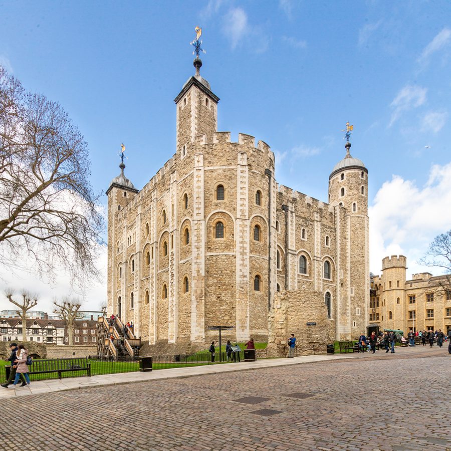 The Tower of London viewed from a courtyard. The Jewel House can be seen behind the Tower