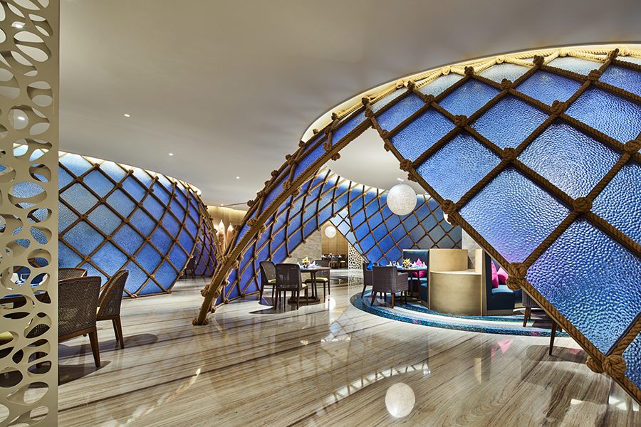 Interior view of the modern, luxurious and elegant design of the lobby at Crowne Plaza Ningbo Xiangshan Sea View hotel, China 