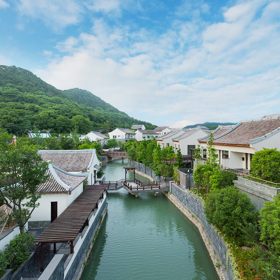 A relaxing bird’s eye view of the outdoor area by the lake and villas during daytime at Park Hyatt Ningbo Resort and Spa, China 