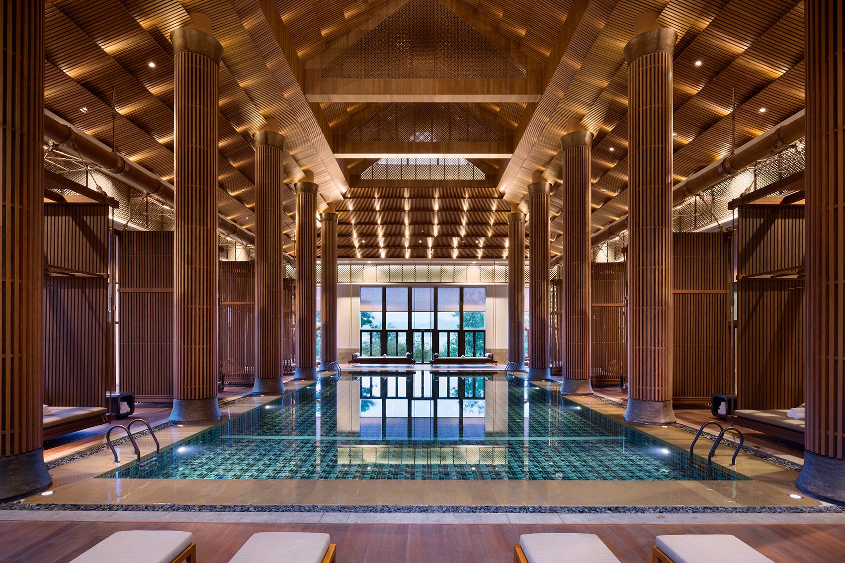 An interior view of the large, beautifully designed indoor swimming pool at Park Hyatt Ningbo Resort and Spa, China 