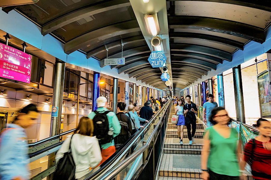 Commuters travel on the Central – Mid-levels escalator in Hong Kong