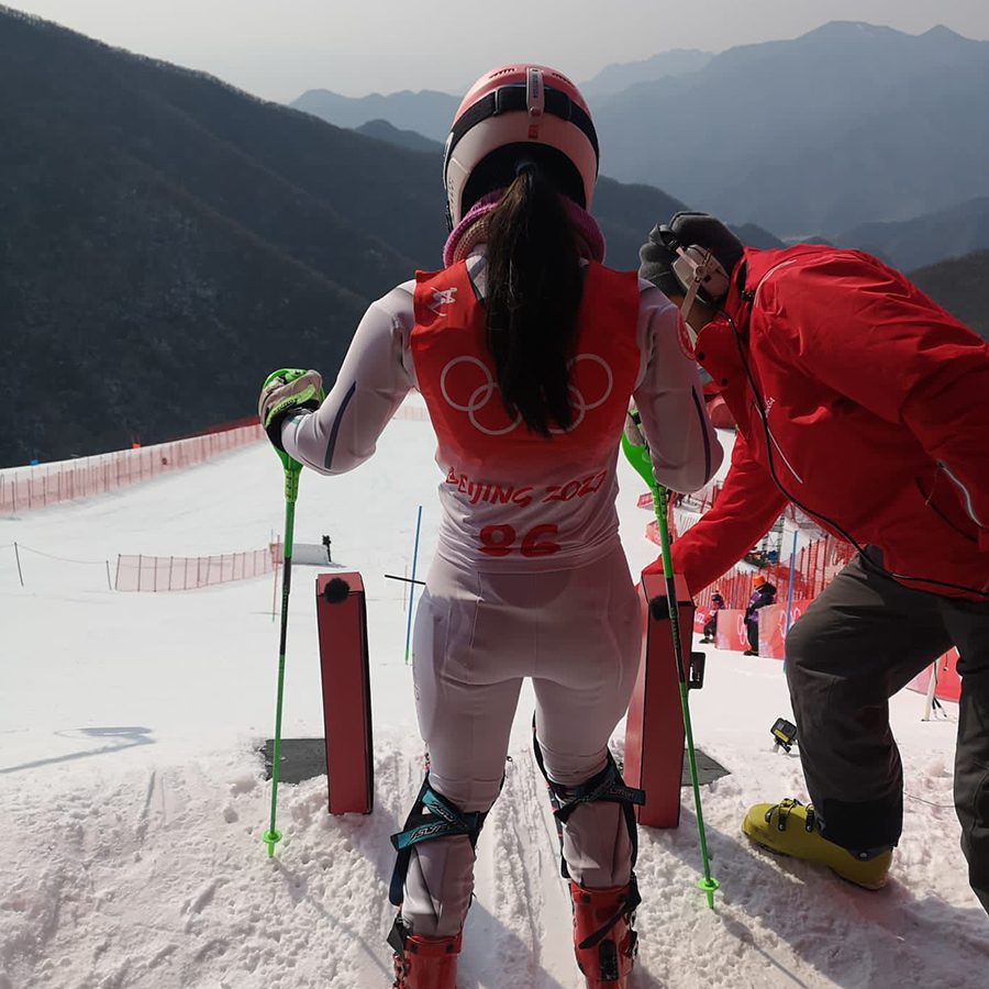 Audrey King at the top of the slopes, getting ready to start a run in the Beijing 2022 Winter Olympics