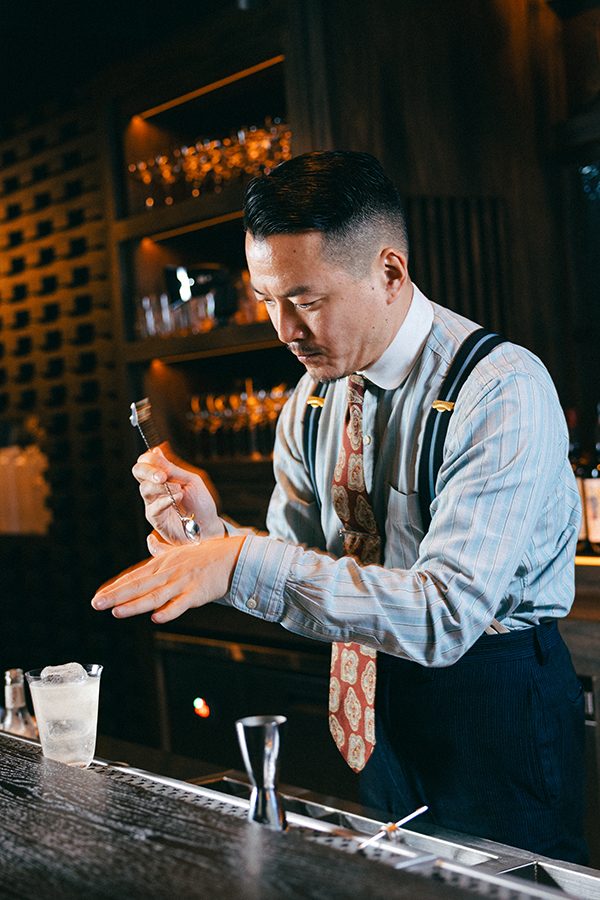 Shingo Gokan mixing a drink at his bar in Hong Kong, Gokan