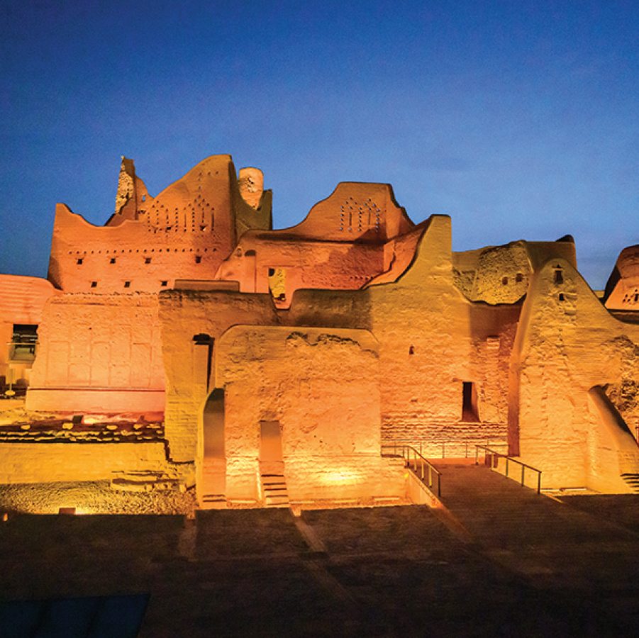 Palwa Palace, a traditional mudbrick structure in Diriyah, lit up at night