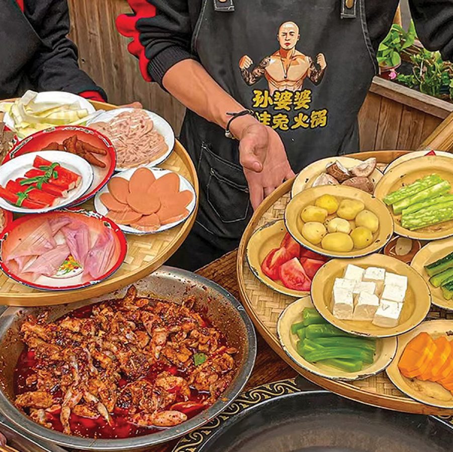 Bamboo trays covered in hot pot ingredients at Sun Popo Mei Wa Tu Huoguo, Chengdu