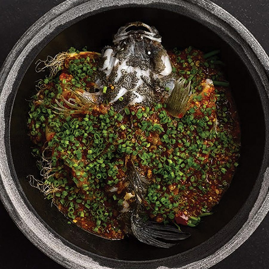 Signature stone pot fish dish at The Bridge, Chengdu