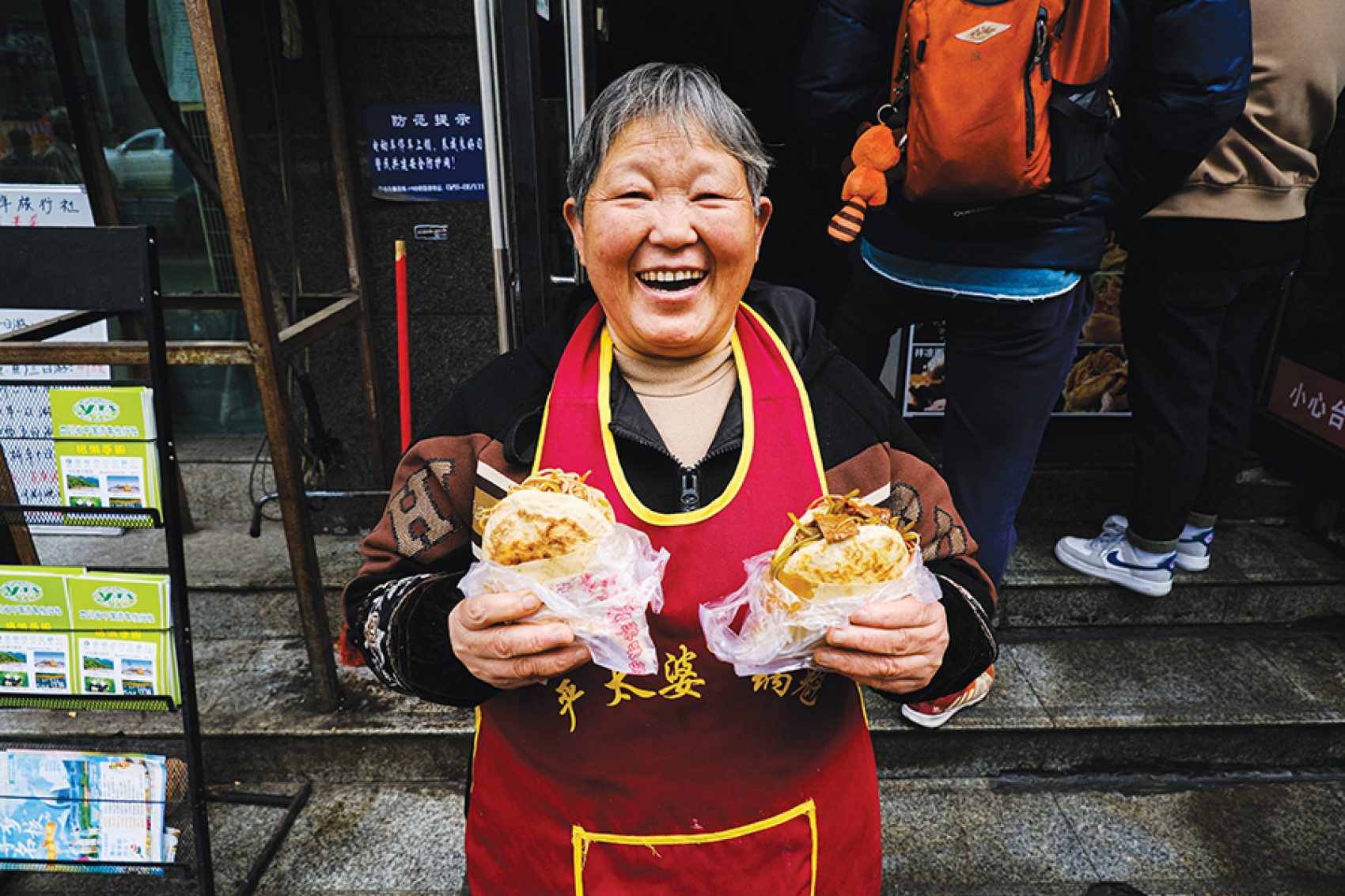 Granny Yan Taipo with her famous guokui dishes in Chengdu