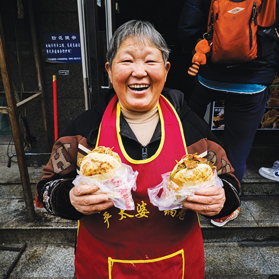 Granny Yan Taipo with her famous guokui dishes in Chengdu