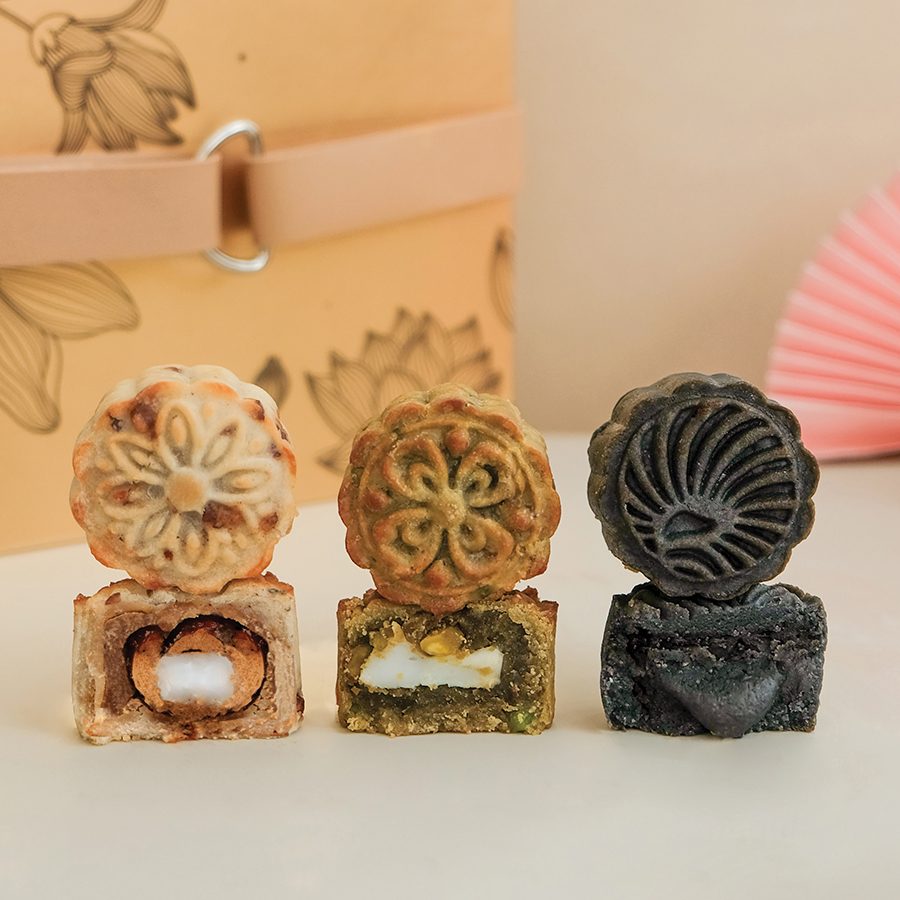 The Cakery’s mini mooncakes in black sesame, red date and pistachio flavours