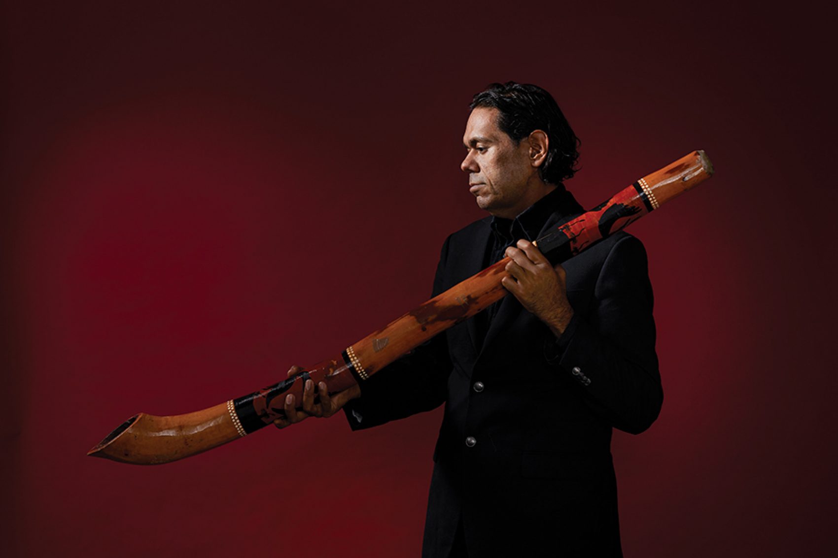 William Barton holding a didgeridoo