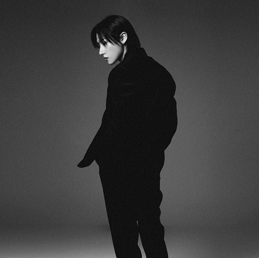 Monsta X member I.M dressed in black