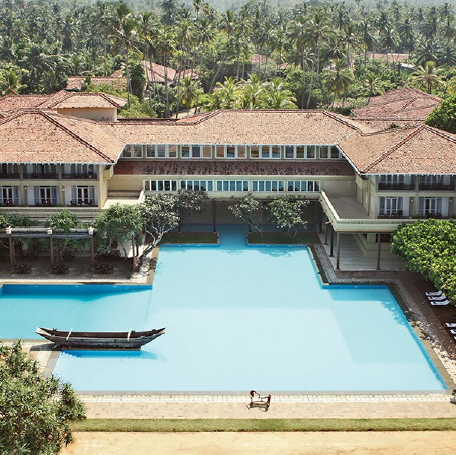 Aerial view of the Blue Water hotel, a sprawling building with a pool, in Wadduwa, Sri Lanka