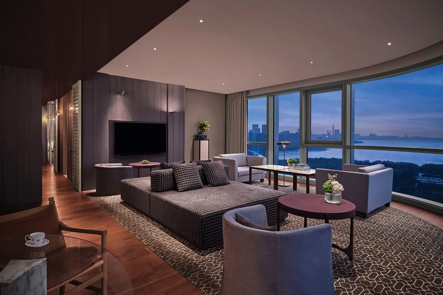 A guestroom with a large floor-to-ceiling window at Andaz Shenzhen Bay hotel