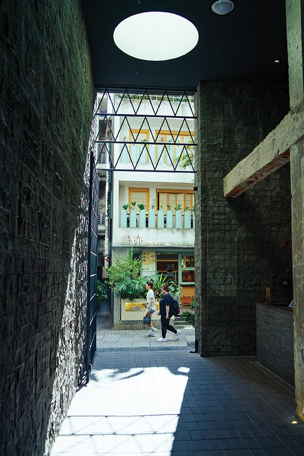 A street view of two women walking at U1 Platform Market on Chunjing Street a sunny day in Nantou Ancient City