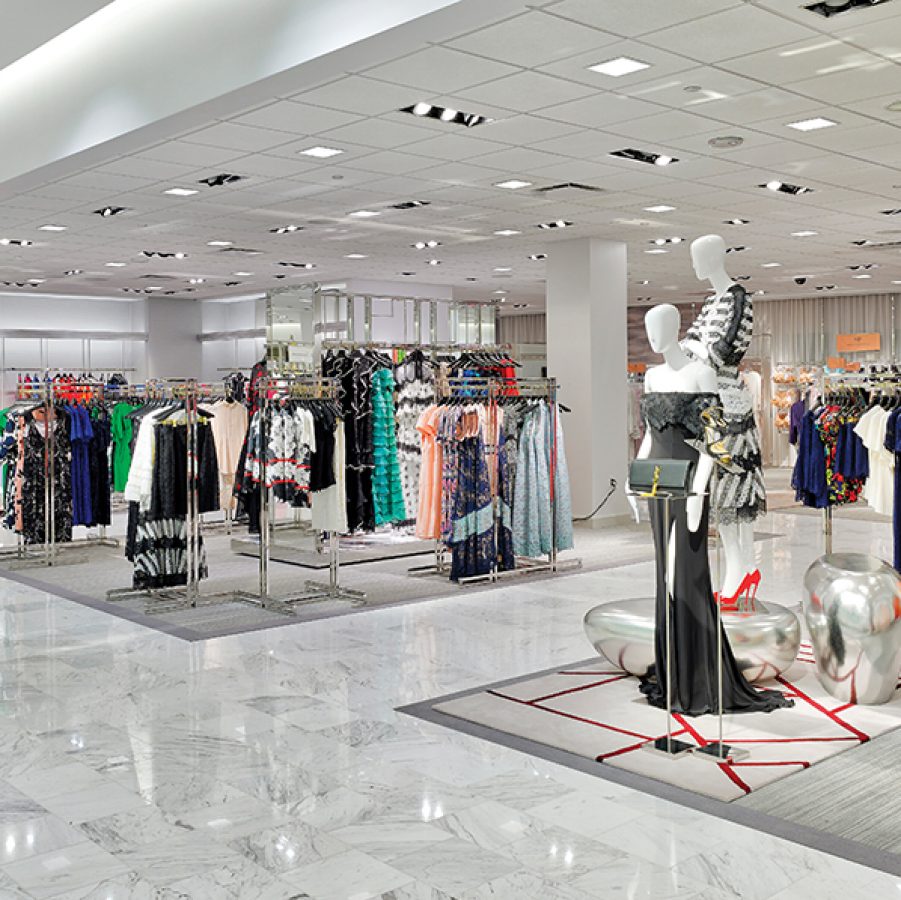 An interior view of a high-end fashion retail store with luxury brands at Union Square in San Francisco