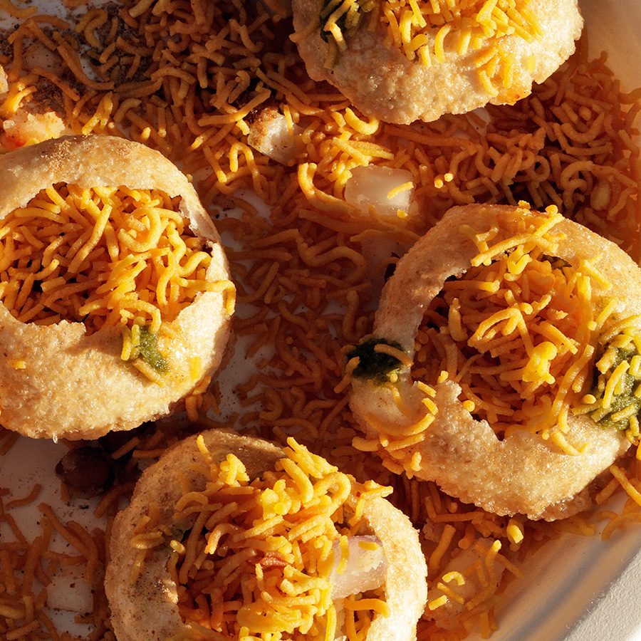 A closeup of a plate of golgappa pani puri (phuhka or phulki) 