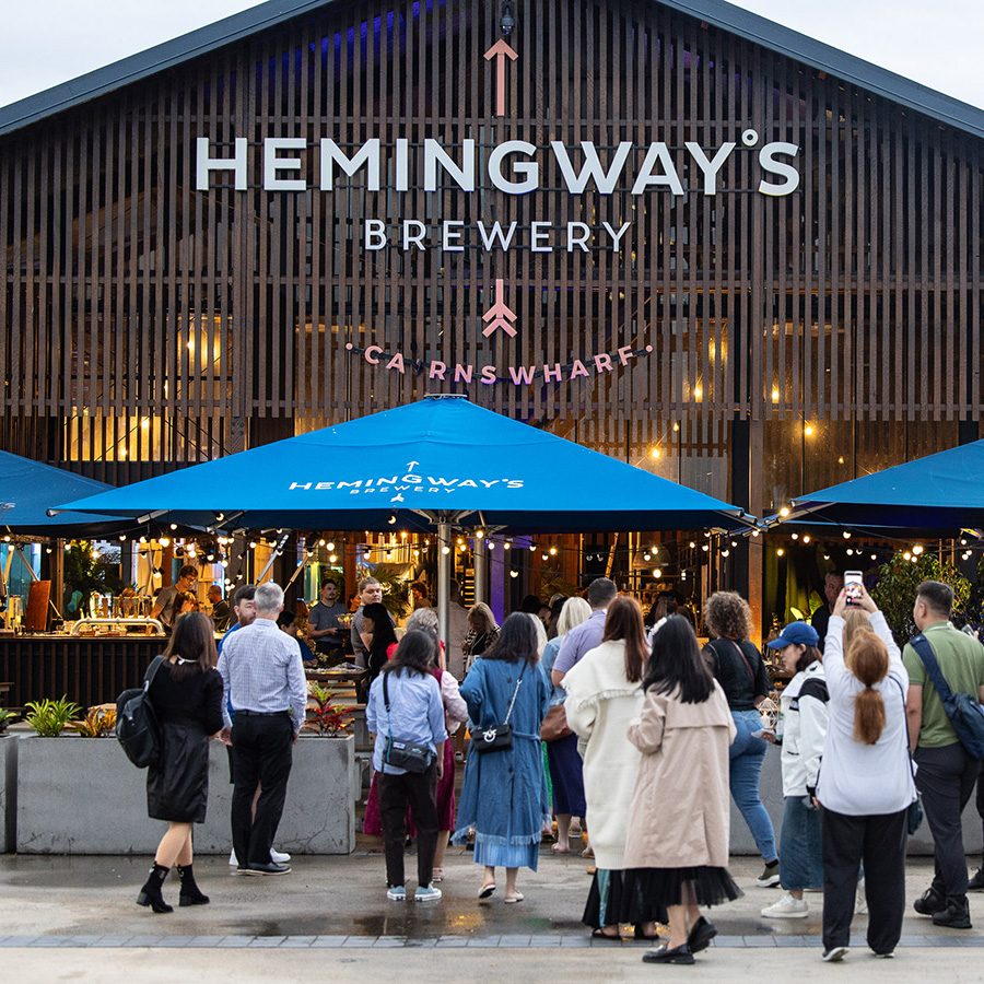 A group of people standing outside Hemingway’s Brewery.