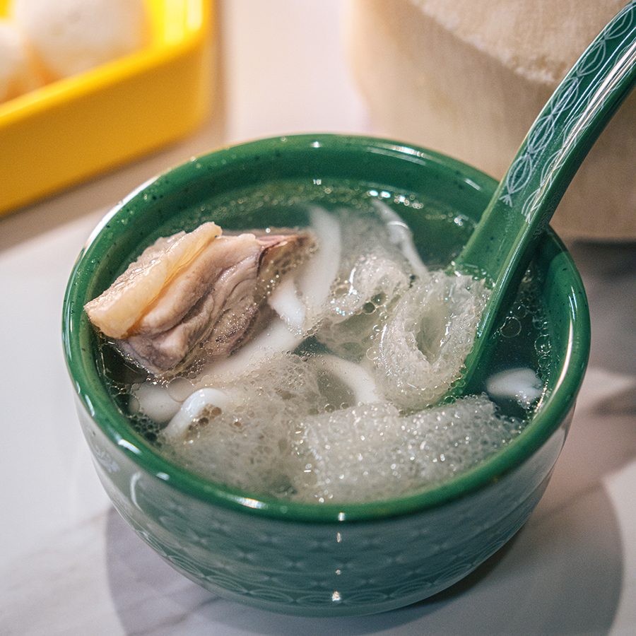 Hotpot broth made with coconut flesh and bamboo fungus at Season