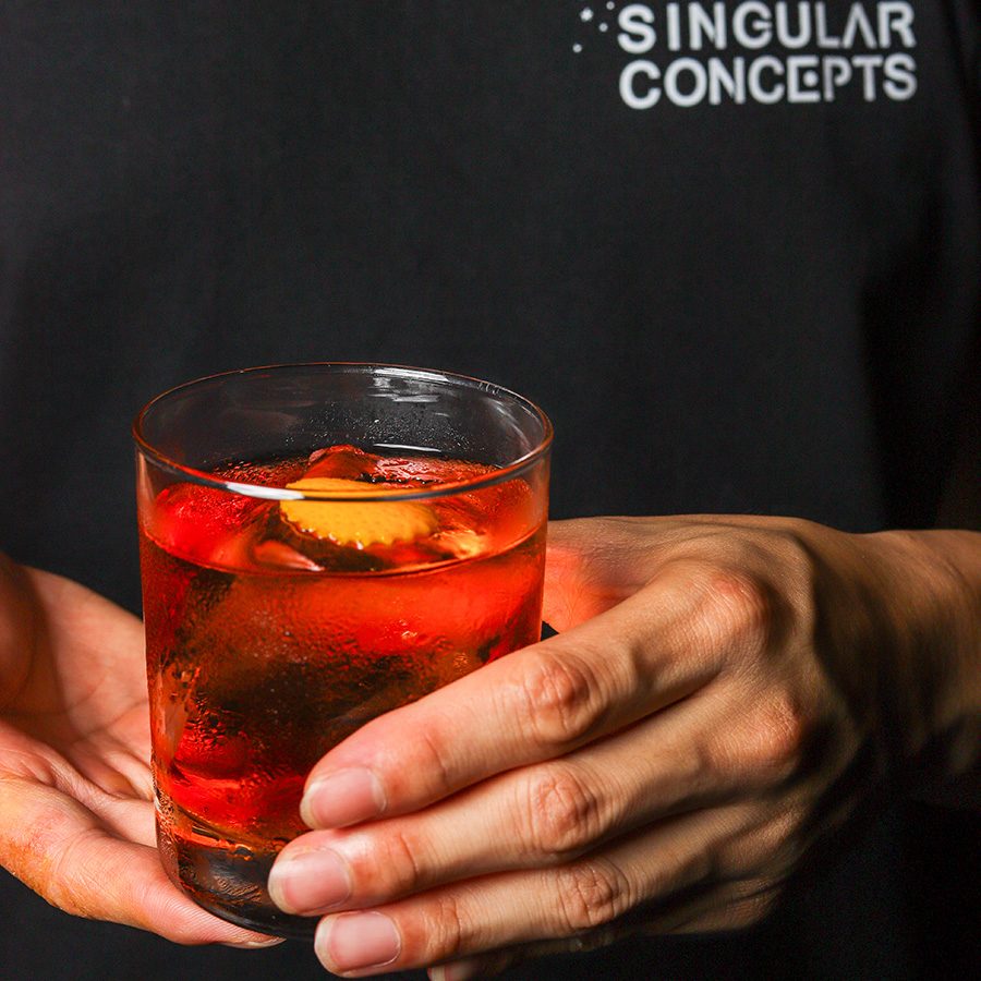 Negroni held by a member of Singular Concepts 