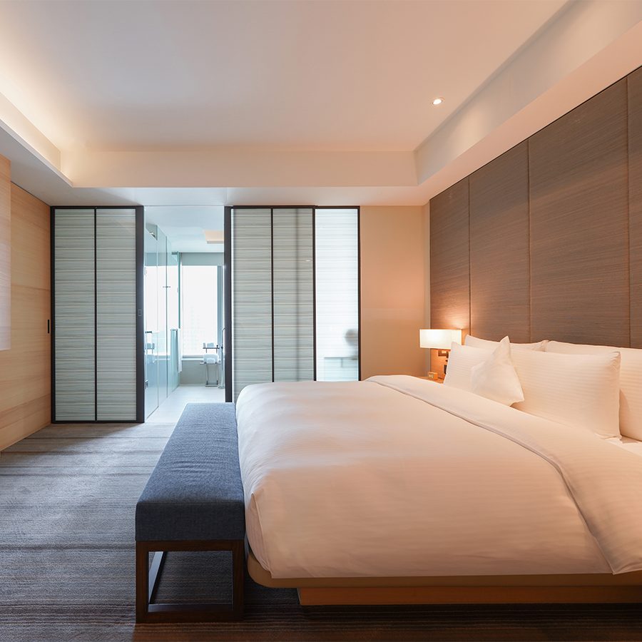 A light, spacious guestroom at Hotel Cozzi Zhongshan Kaohsiung 