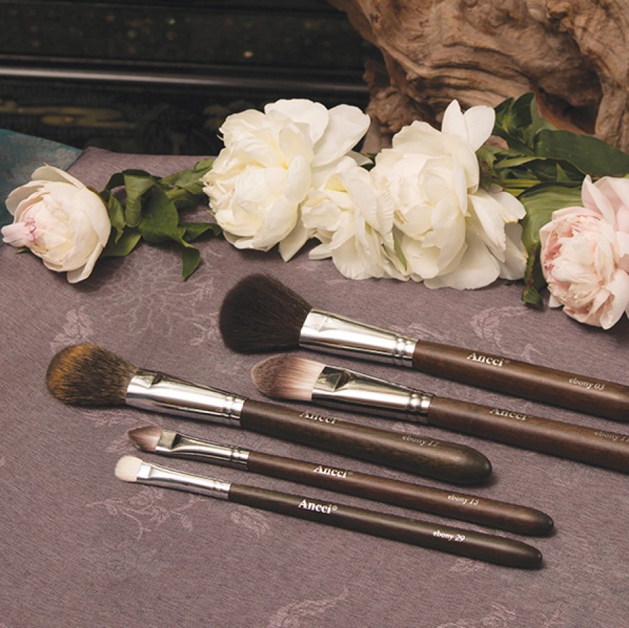 A set of five Ancci ebony makeup brushes