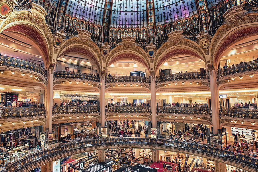 Interior of famed department store Galeries Lafayette, including its  glass dome