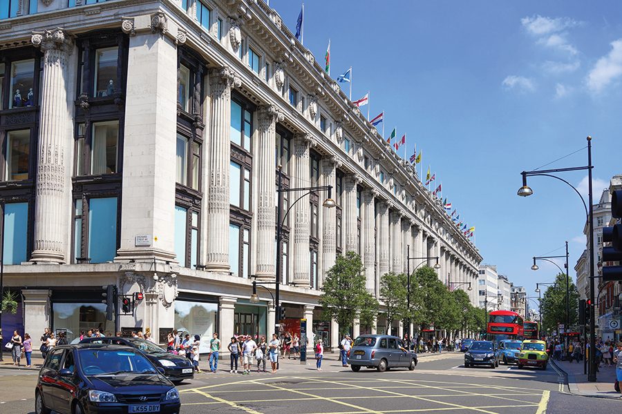 An exterior shot of famous department store Selfridges on Oxford Street in London