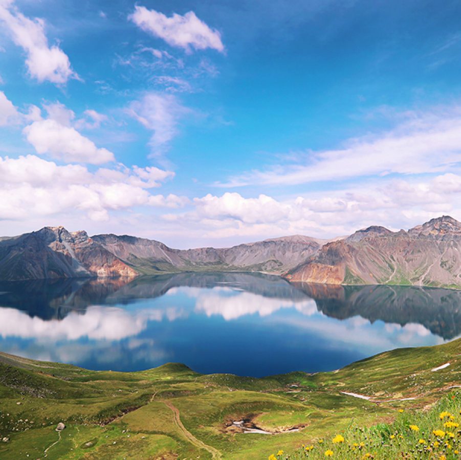Heavenly Lake with Changbai Mountain in the background and blue skies above