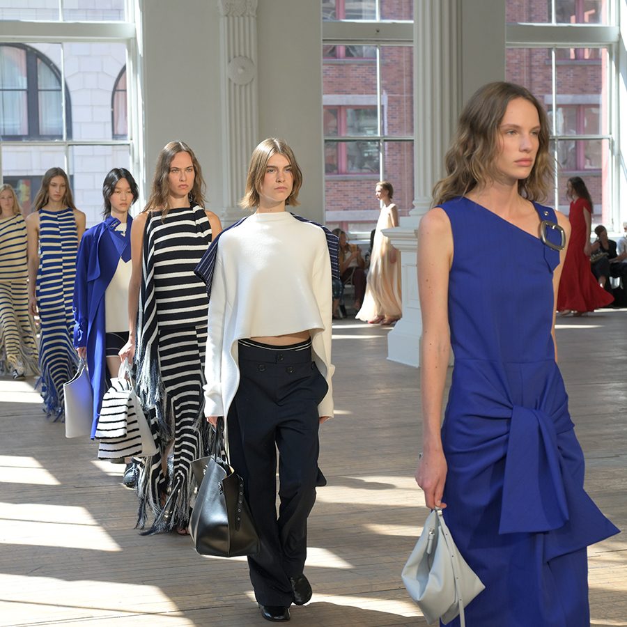 Female models wearing Proenza Schouler’s wide variety of clothing on the runway.  