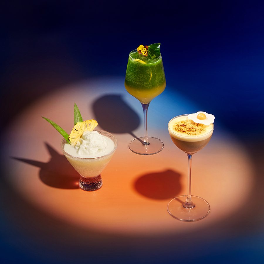 Three various cocktails and mocktails, Egg Coffee Martini, Frozen Virgin Pina Colada, Clementine Matcha Lemonade, served at Blank Sky Lounge. 
