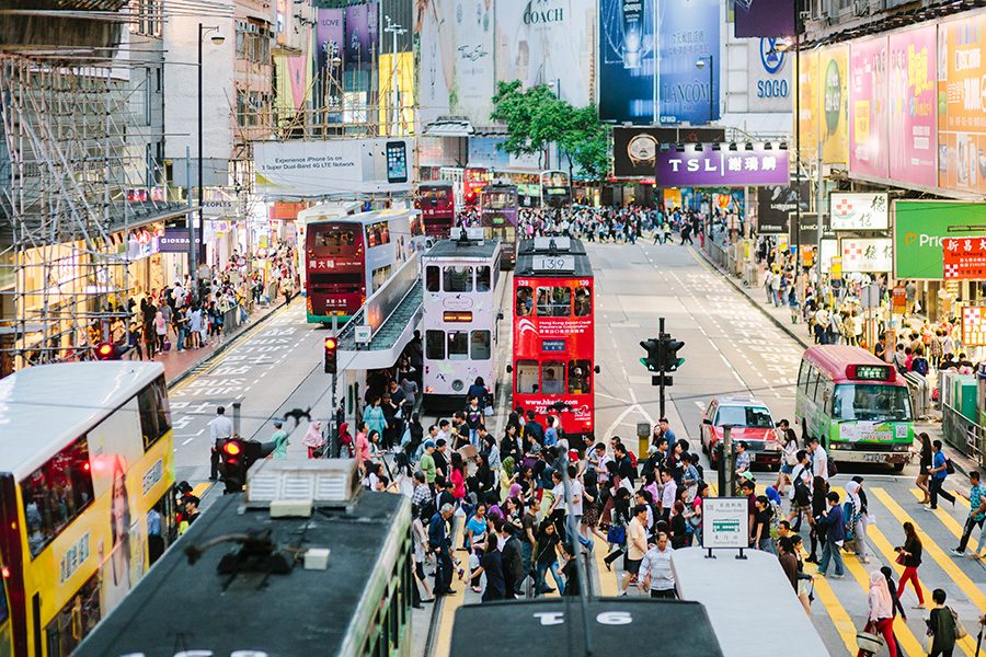 Trams driving through Hong Kong streets