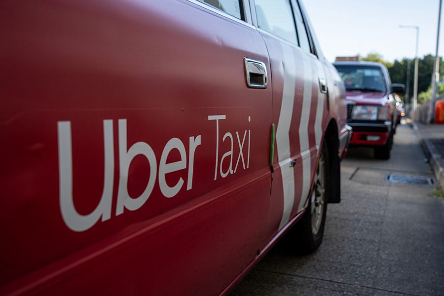 Uber Taxi logo on a Hong Kong taxi 