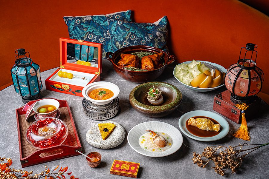 A dining table filled with a variety of mid-autumn dishes; hairy crab claw, tong yuen, soup and dessert, served at Chinesology in Central, Hong Kong 