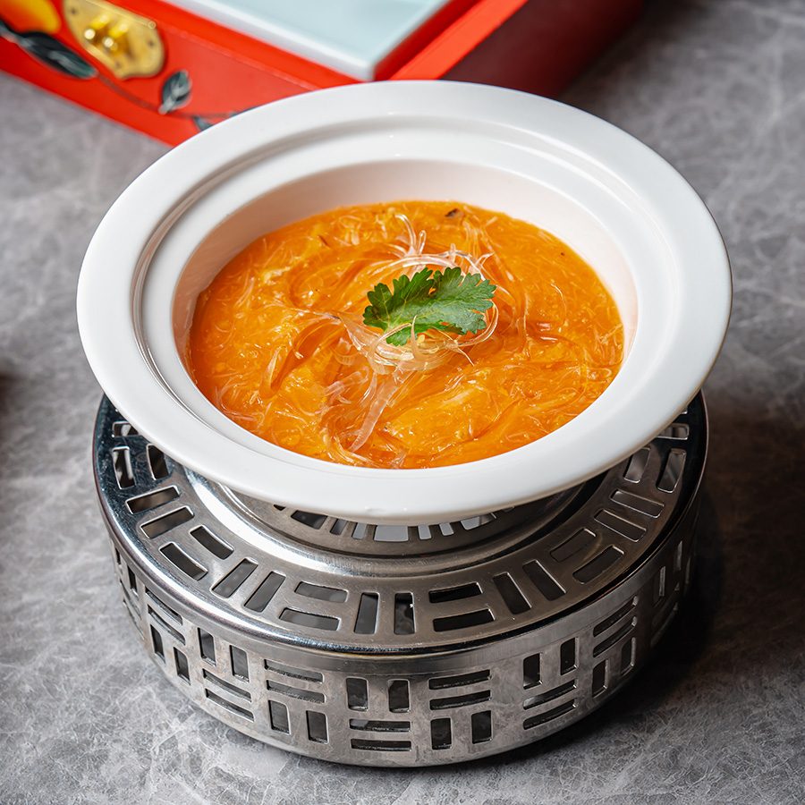 A bowl of braised shark’s fin soup with crab cream in casserole served at Chinesology in Central, Hong Kong 