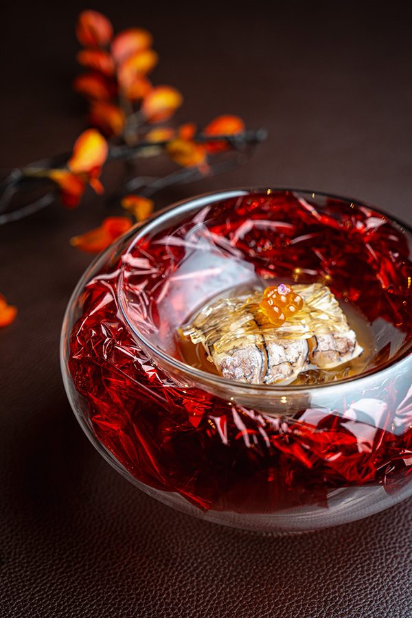 Steamed wild catch threadfin with stewed winter melon stuffed with peach gum served in a glass bowl at Chinesology in Central, Hong Kong 