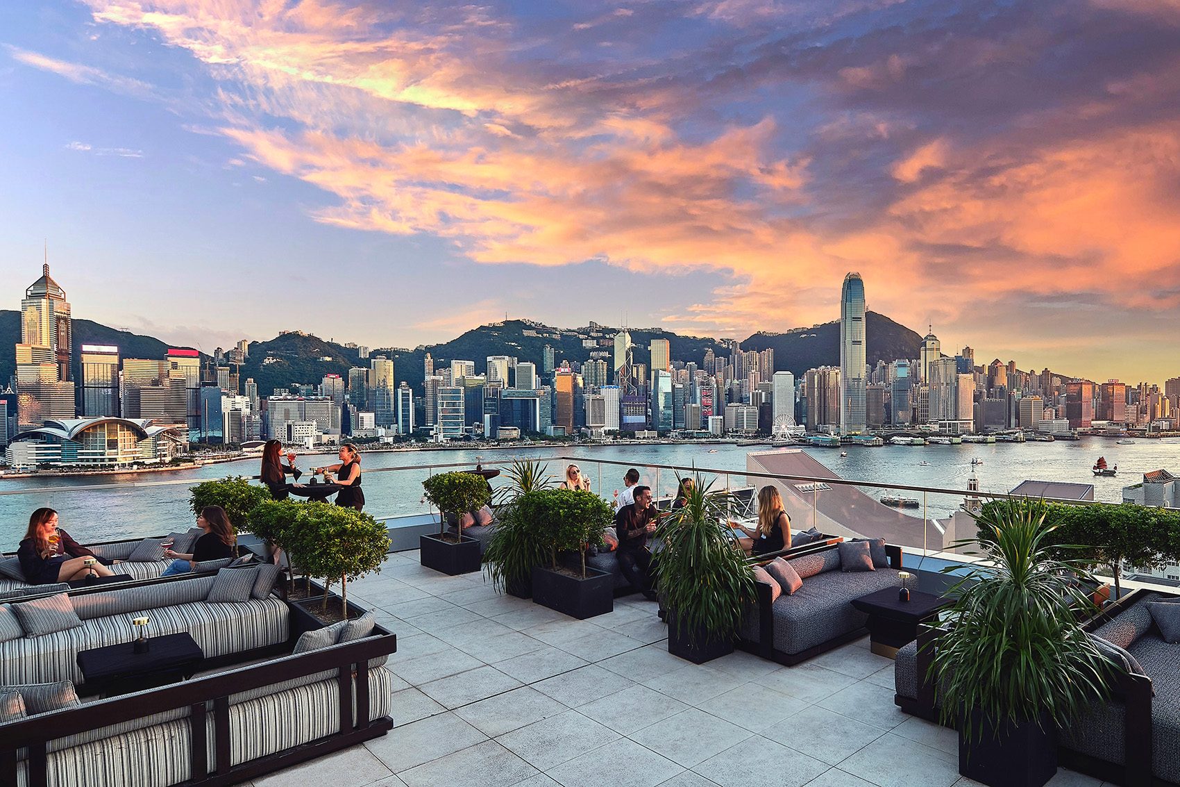 The garden terrace of Aqua Spirit in Hong Kong at sunset. 