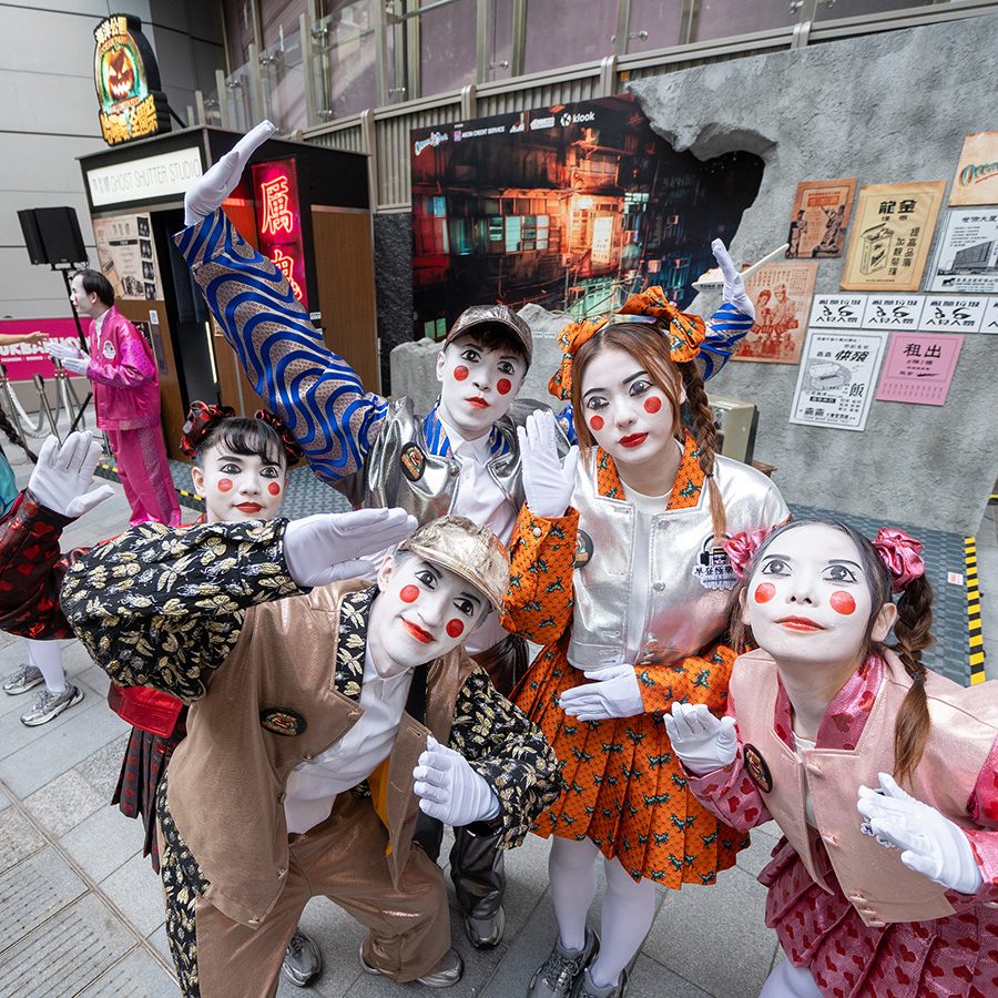 Costumed crowd outside an Ocean Park Halloween Fest attraction.