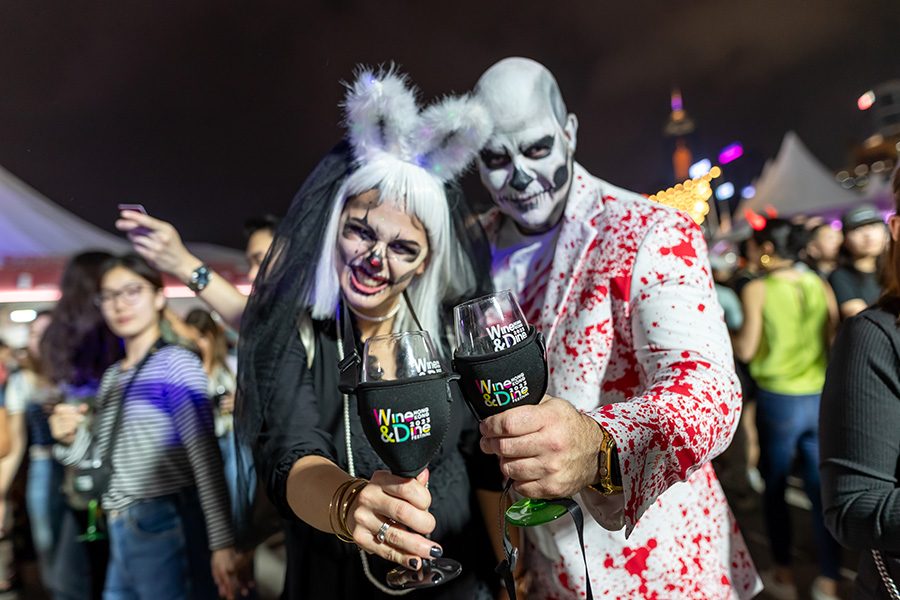Costumed festival goers at the Hong Kong Wine & Dine Festival.